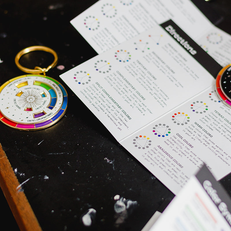 The Original Color Wheel© Interactive Spinner Enamel Keychain (White/Gold) Boxed