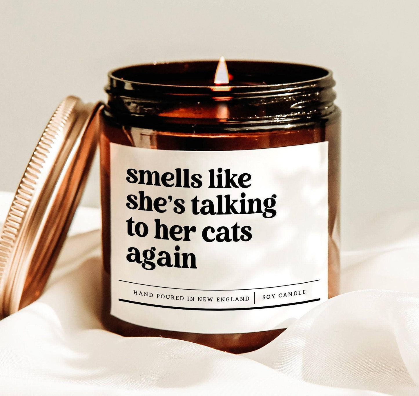 Smells like she's talking to her cats again candle
