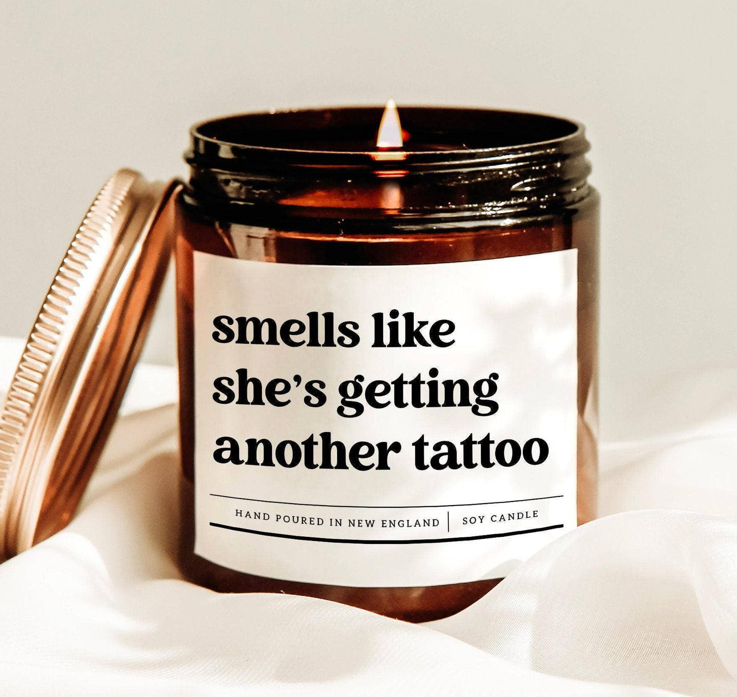 Smells like she's getting another tattoo candle